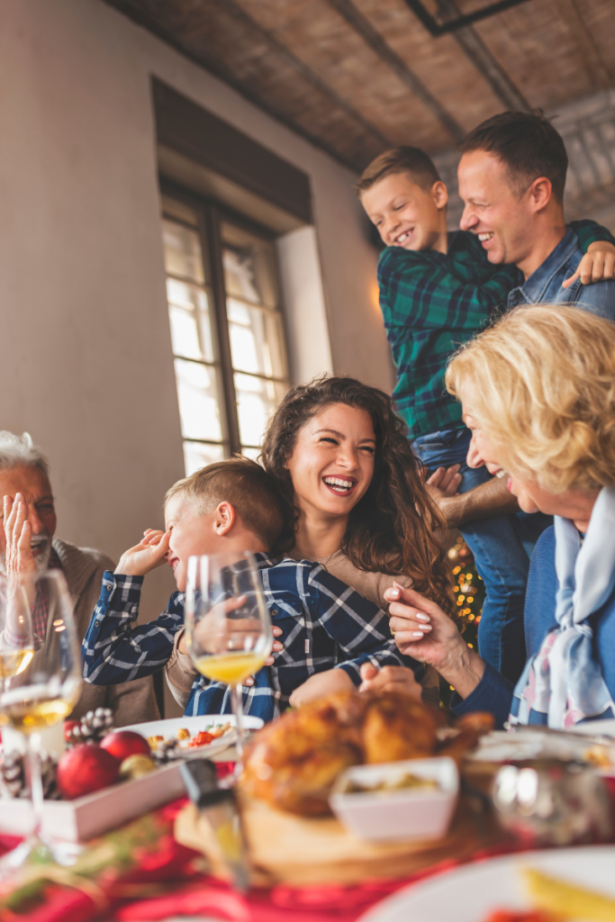 Creating memories in a peaceful haven: Multigenerational family enjoys a meal and conversation in a calming home sanctuary.