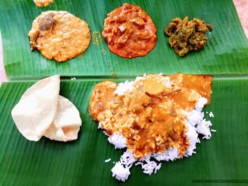 Traditional banana leaf South Indian vegetarian thali served in Little India, George Town – part of a Penang visa run travel story